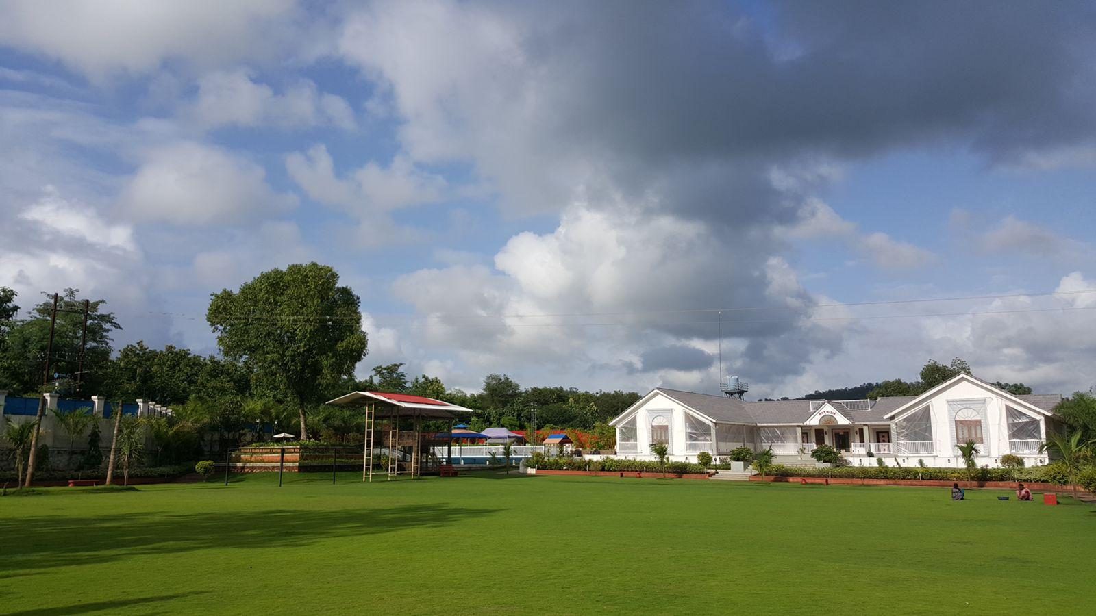 Samjubaa Farm exterior at dusk